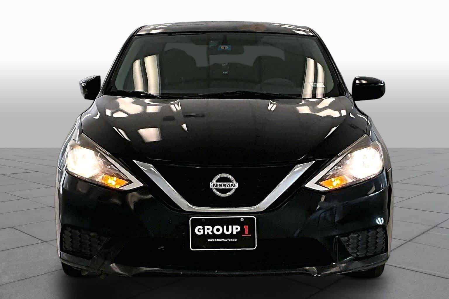 Used 2017 Super Black Nissan SV image 3
