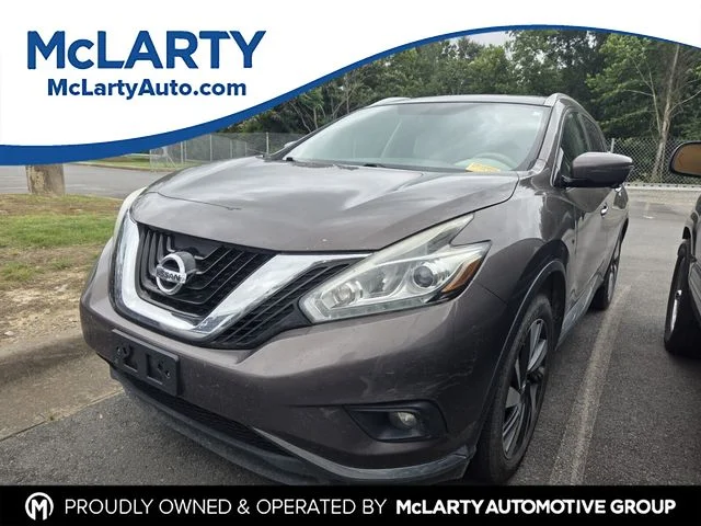Used 2016 Brown Nissan Platinum image 1