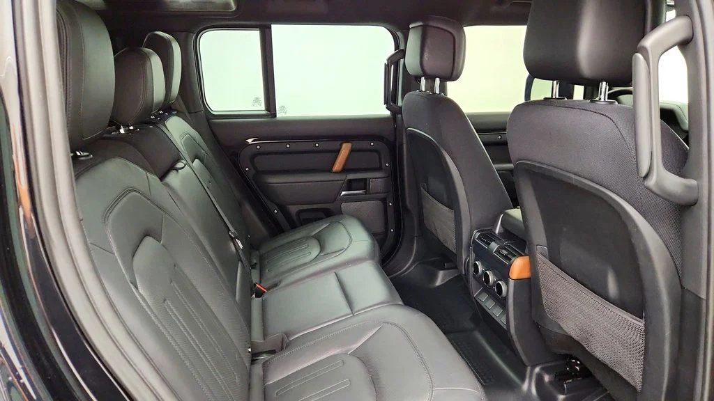 Used 2023 Santorini Black Metallic Land Rover 110 X AWD w/ Explorer Pack, Extended Black Ext. & Towing Pack image 24