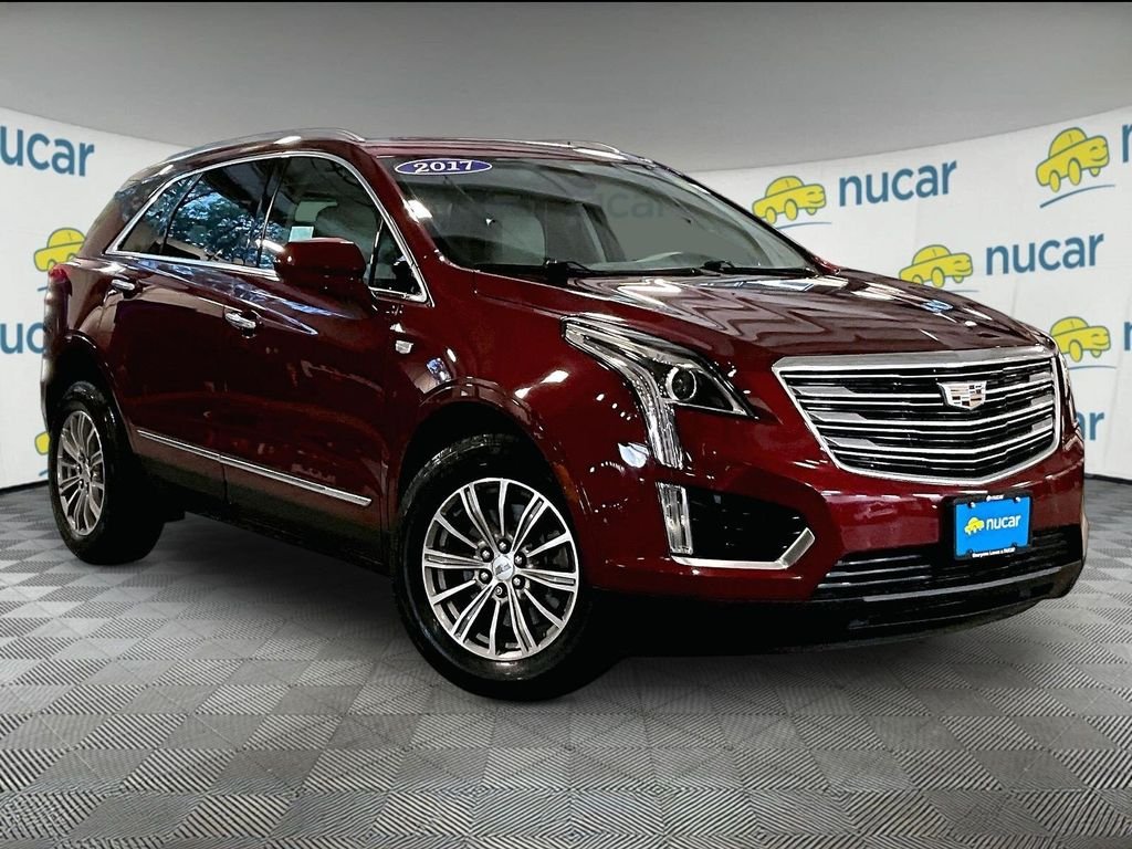 Used 2017 Red Cadillac Luxury image 1