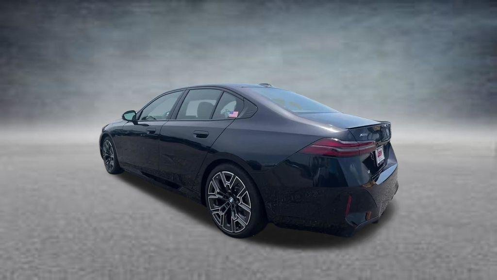 New 2027 Carbon Black Metallic BMW 550e xDrive image 10