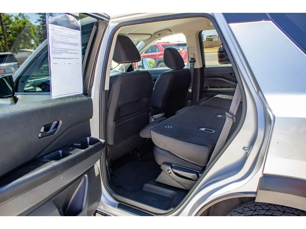 Used 2024 Brilliant Silver Metallic Nissan SV image 16