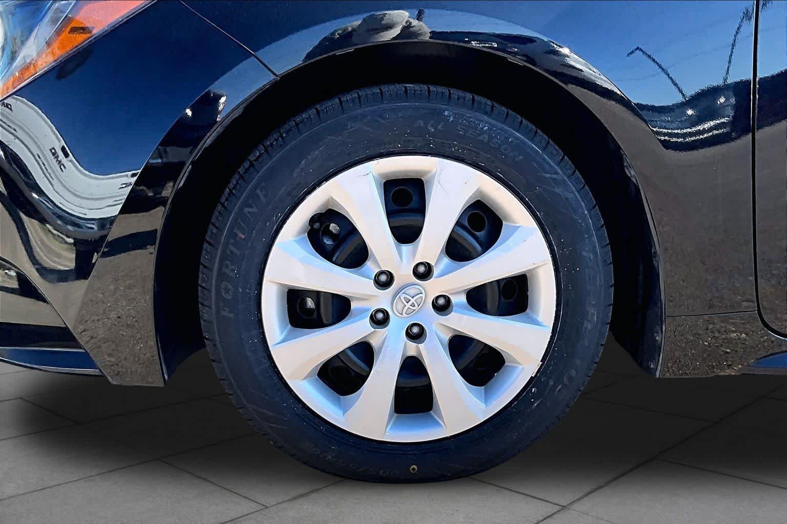 Used 2025 Midnight Black Metallic Toyota LE image 11