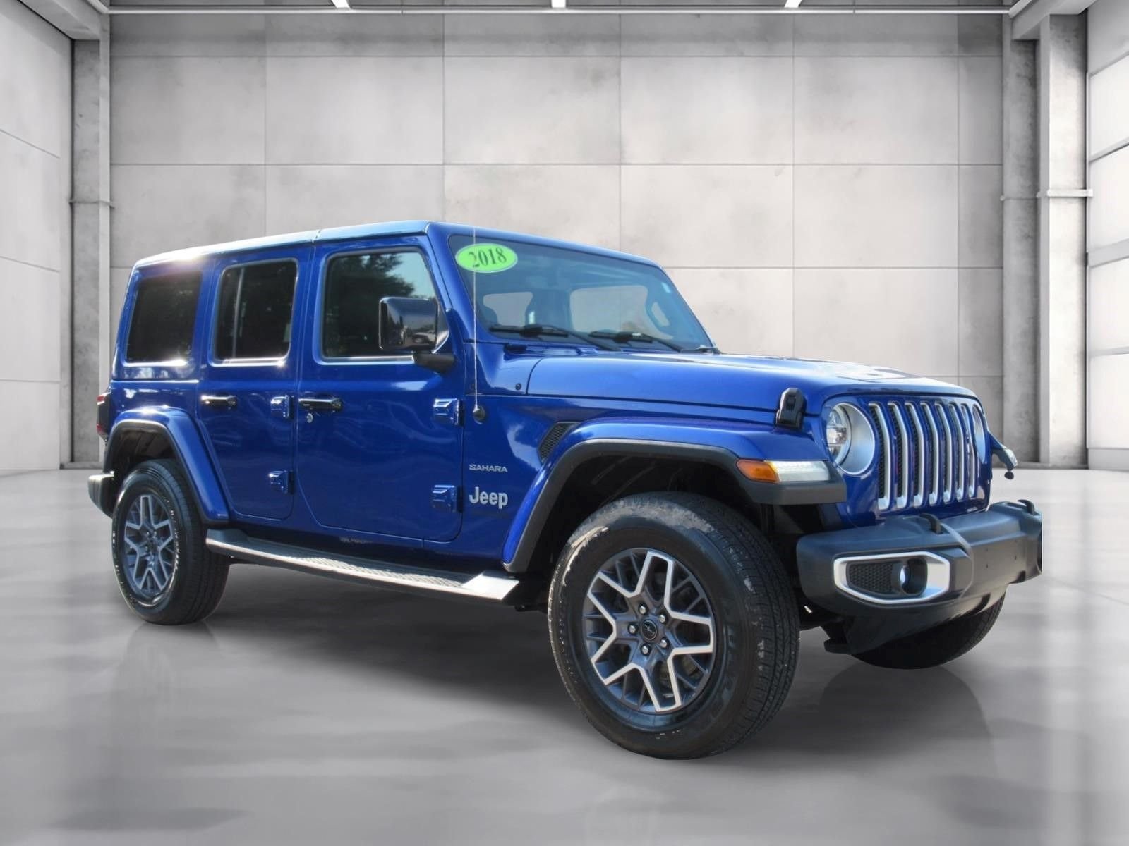 Used 2018 Blue Jeep Unlimited Sahara image 1