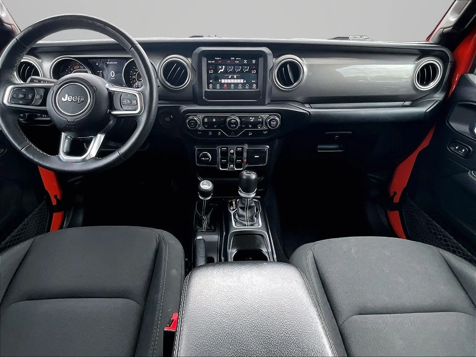 Used 2018 Orange Jeep Unlimited Sahara image 17