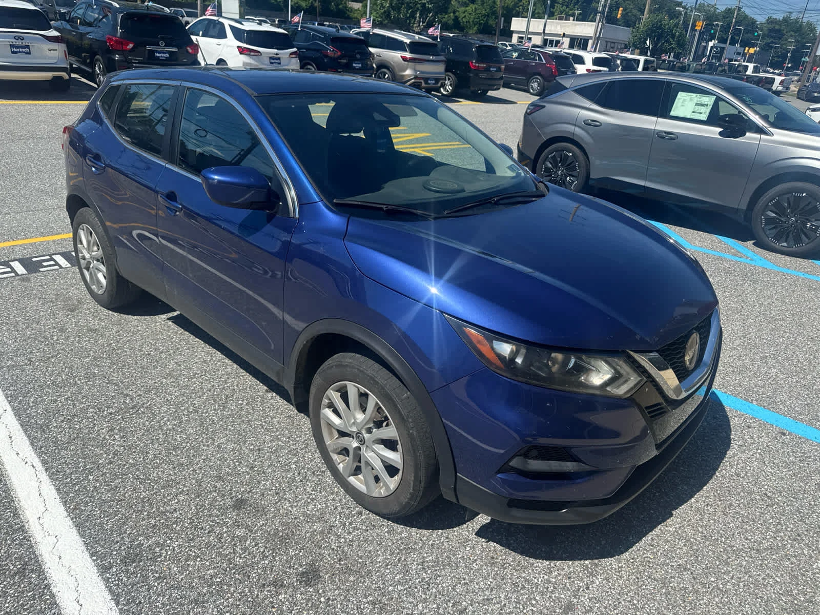 Used 2021 Caspian Blue Metallic Nissan S image 1