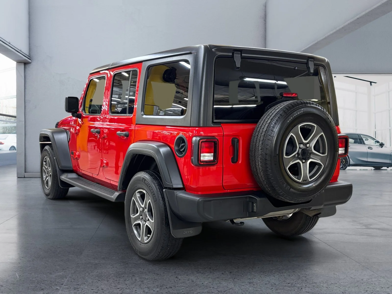 Used 2021 Firecracker Red C/C Jeep Unlimited Sport image 3