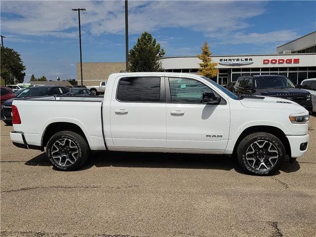 Used 2025 Bright White Clearcoat RAM Laramie 4x4 Crew Cab 144.5 in. WB image 4