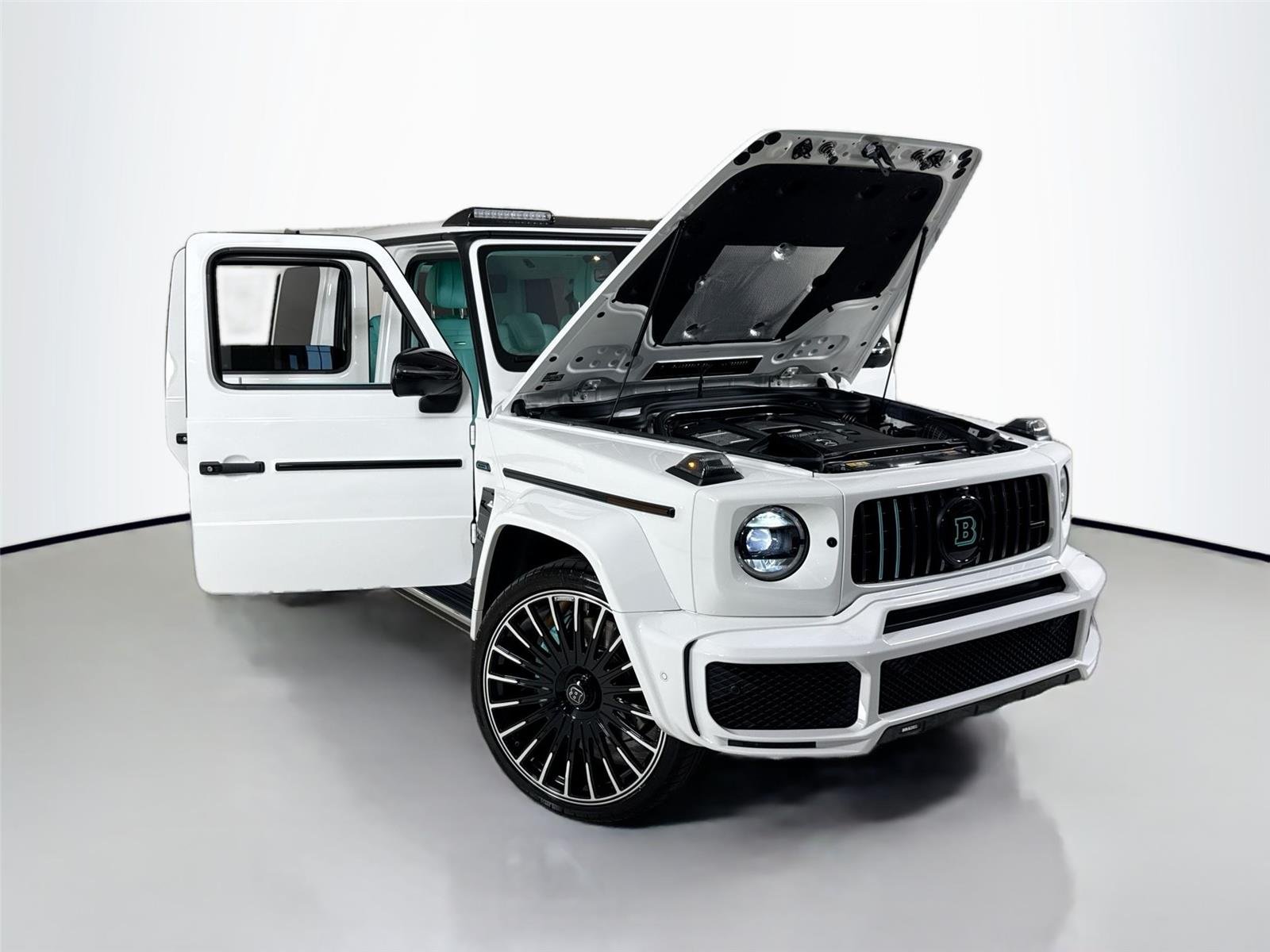 Used 2024 Polar White Mercedes-Benz AMG® G 63  Brabus Custom Widebody / Custom Tiffany Interior image 48