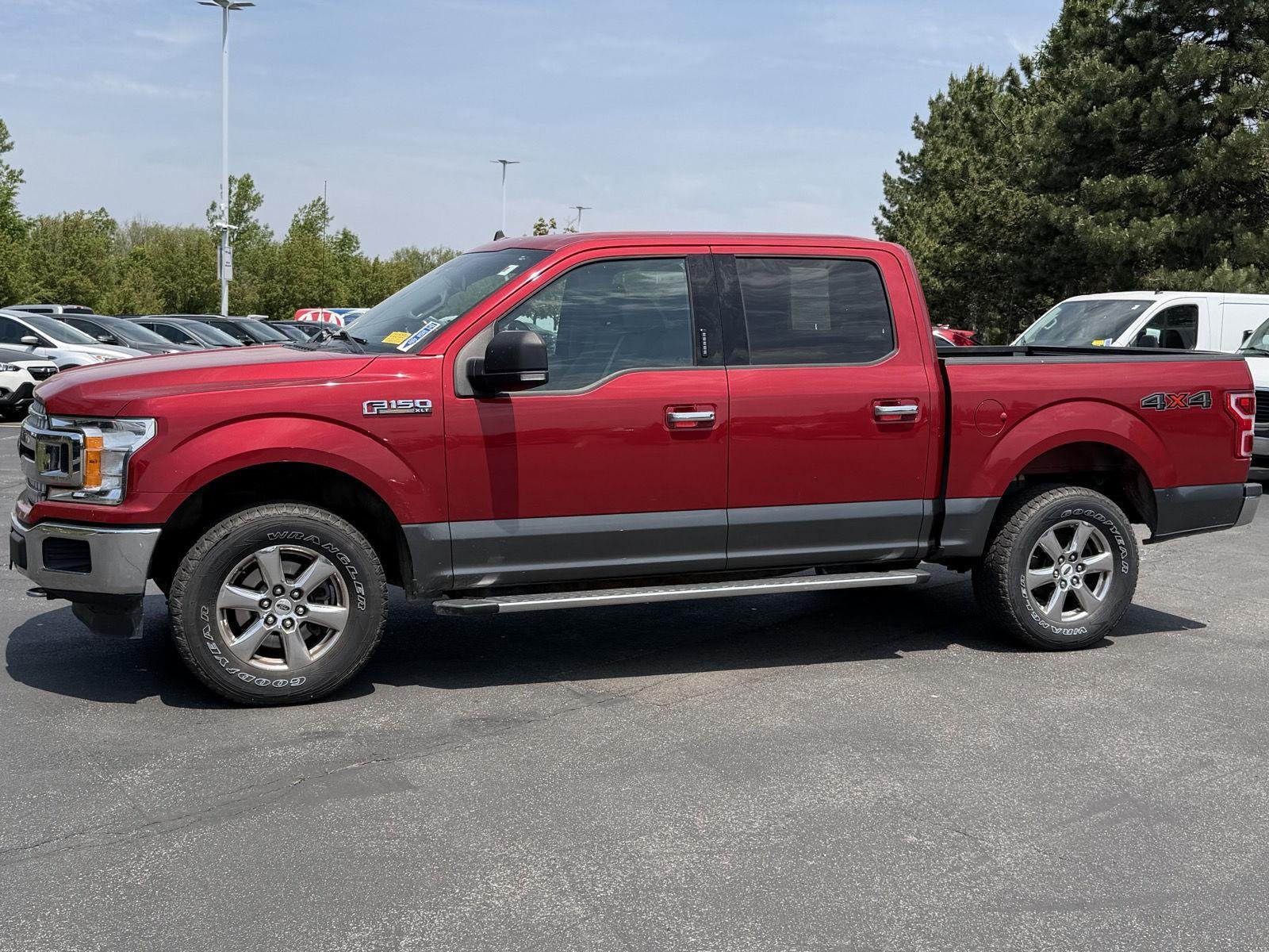 Used 2020 Rapid Red Metallic Tinted Clearcoat/Magnetic Ford XLT image 4