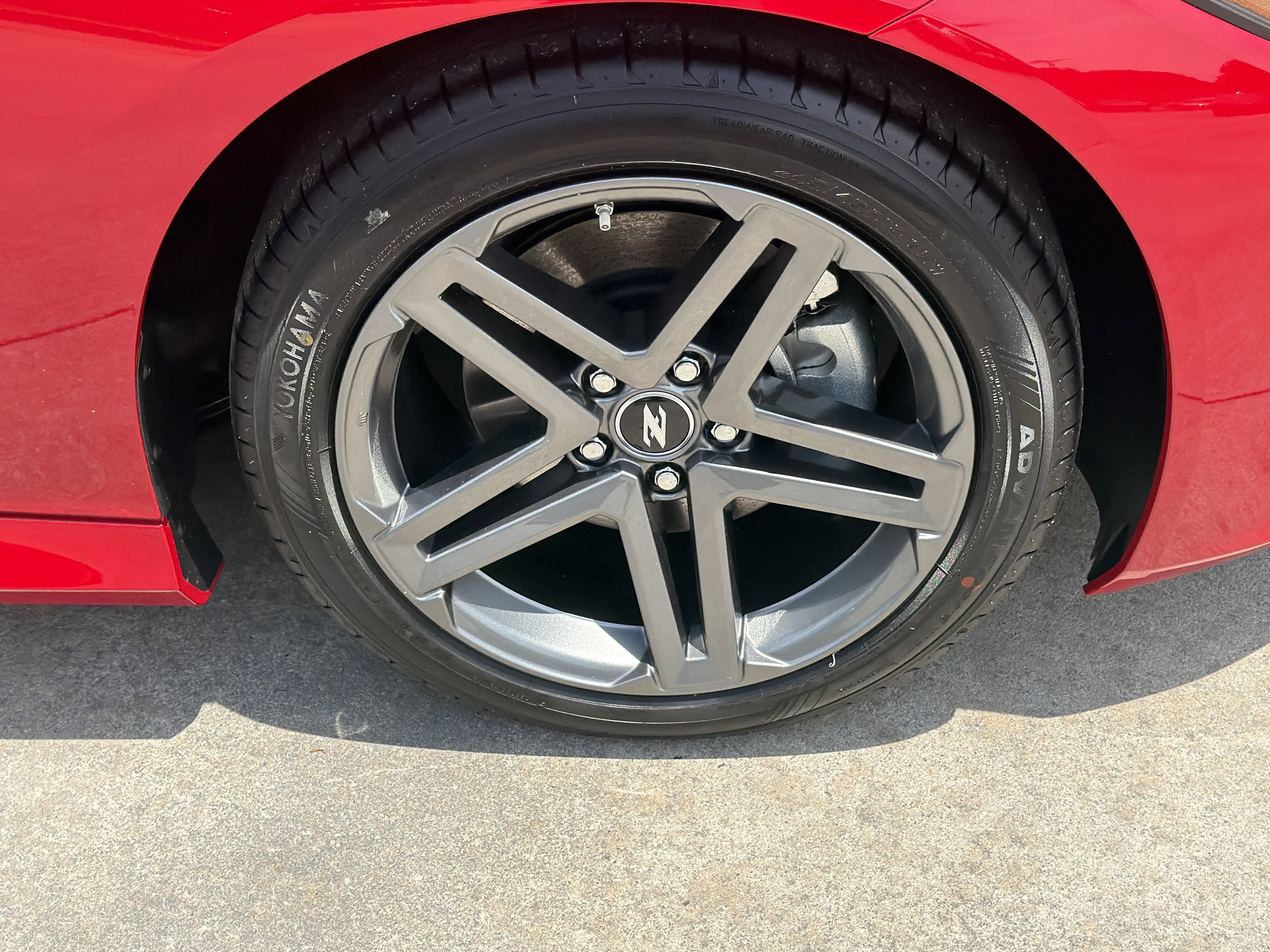 New 2026 Solid Red/Super Black Nissan Sport image 13