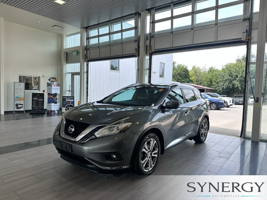 Used 2016 Gun Metallic Nissan Platinum image 1
