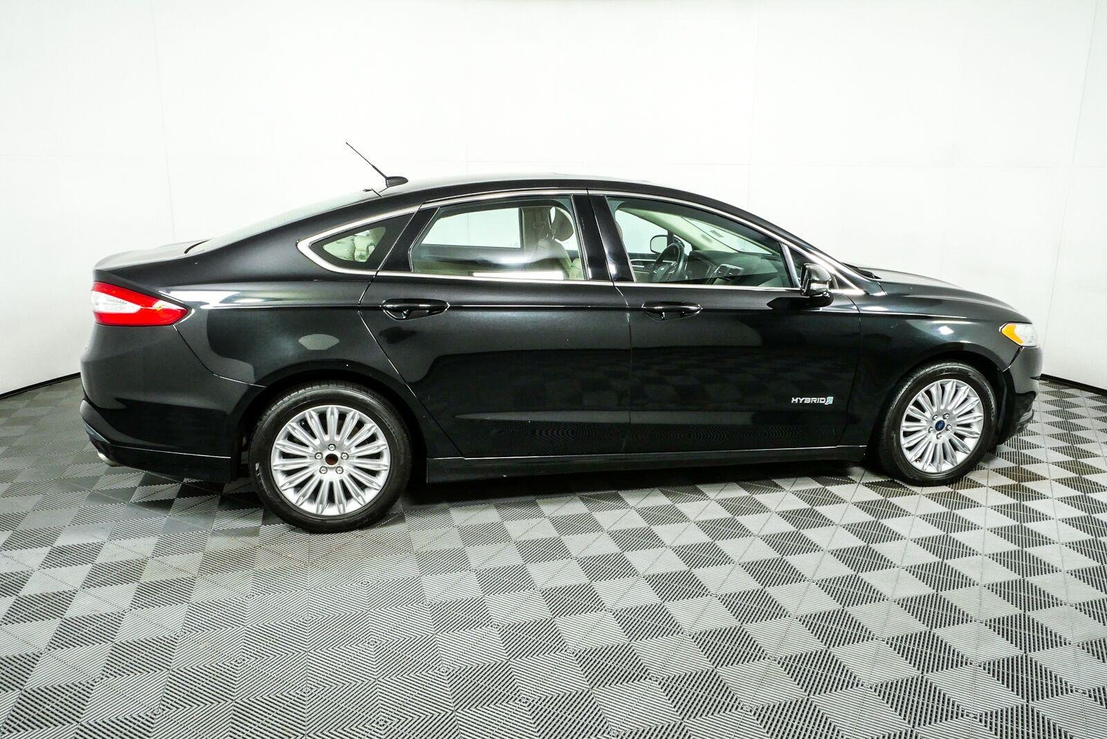 Used 2014 Ford Fusion SE Hybrid with VIN 3FA6P0LU0ER205853 for sale in Atlanta, GA