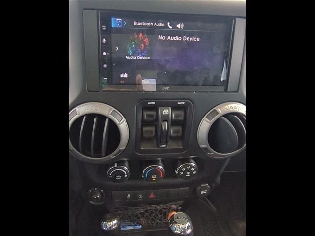 Used 2016 White Jeep Unlimited Sport image 16