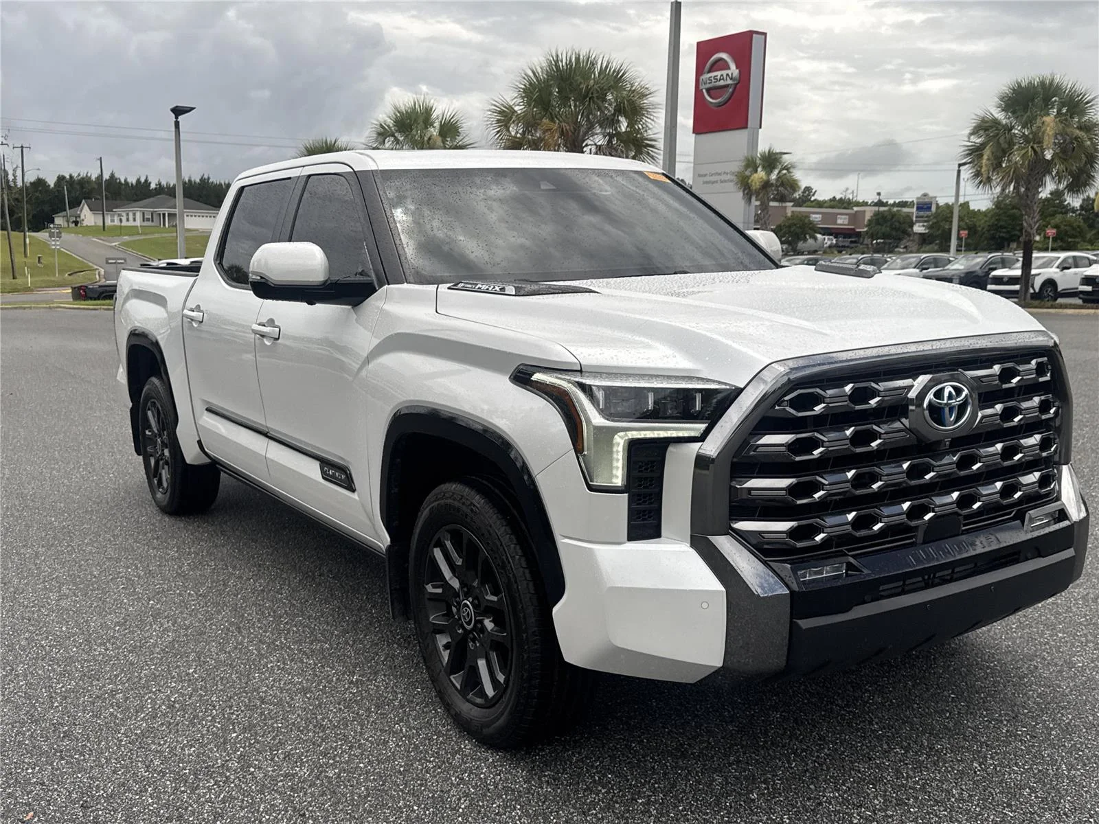 Used 2024 Wind Chill Pearl Toyota Platinum Hybrid image 1