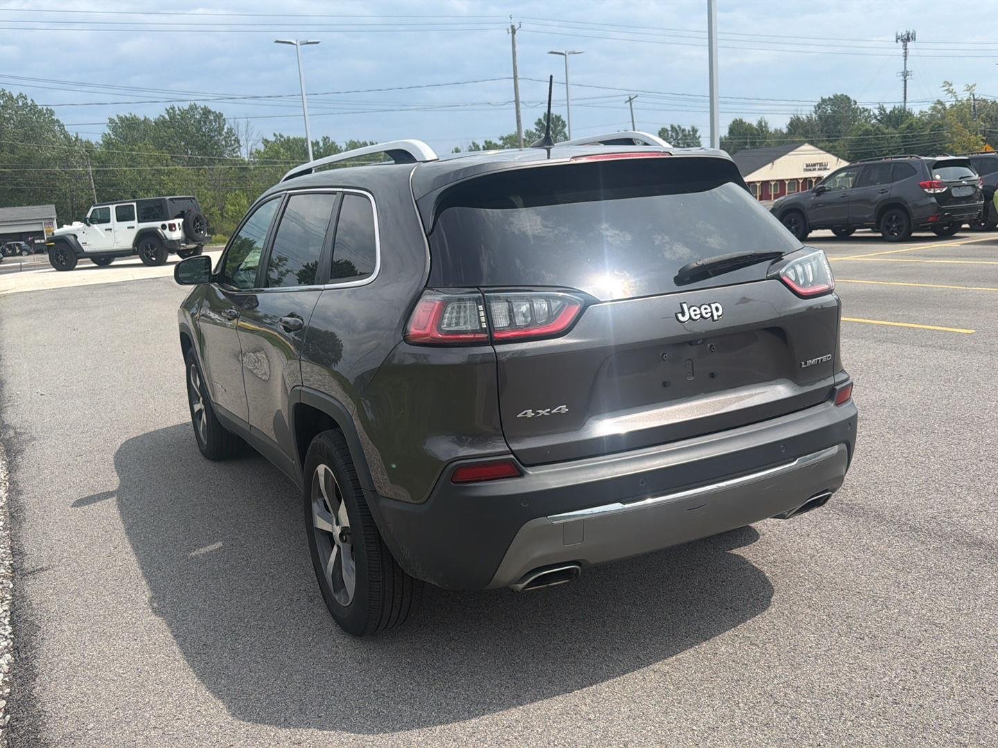 Used 2019 Granite Crystal Metallic Clearcoat Jeep Limited image 6