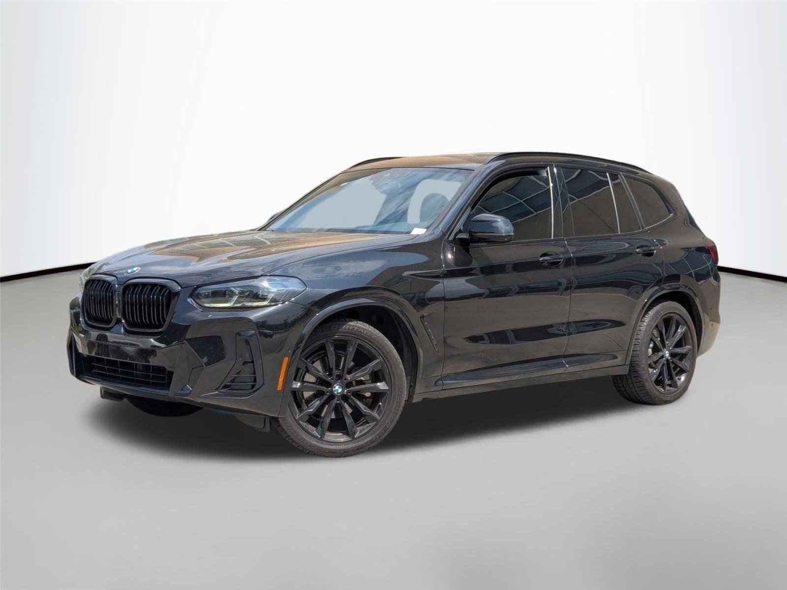 Used 2023 Black Sapphire Metallic BMW xDrive30i image 1