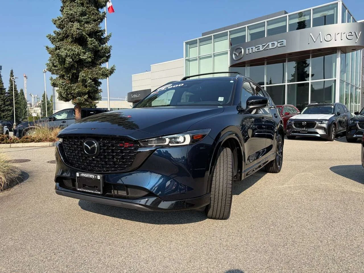 Used 2023 Deep Crystal Blue Mica Mazda Sport Design image 1