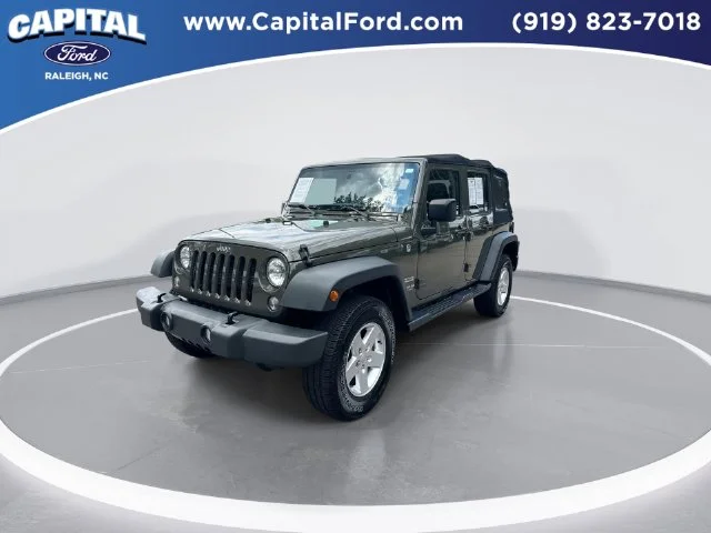 Used 2015 Green Jeep Unlimited Sport image 4