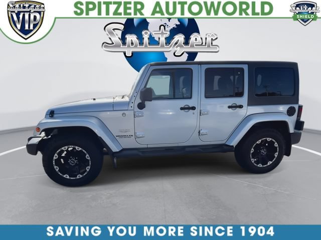 Used 2011 Silver Jeep Sahara image 5