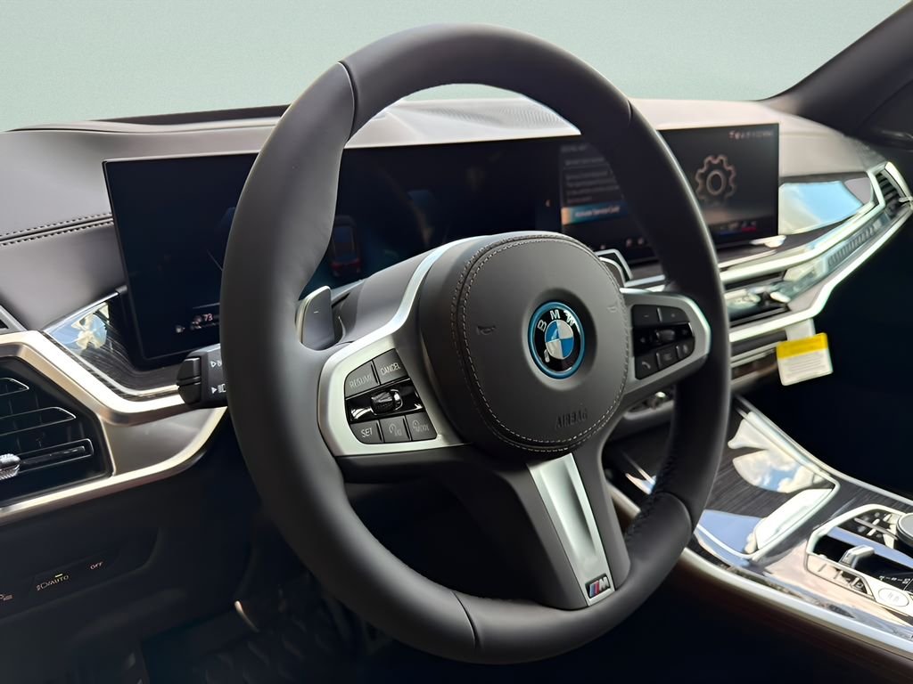 New 2026 Manhattan Green Metallic BMW xDrive50e image 13