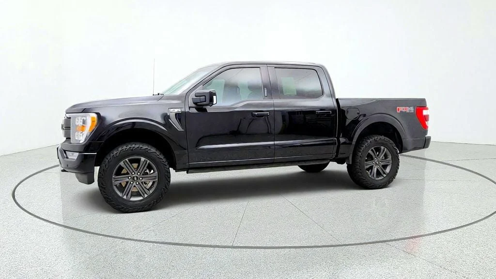 Used 2023 Agate Black Metallic Ford LARIAT 4WD SuperCrew 5.5