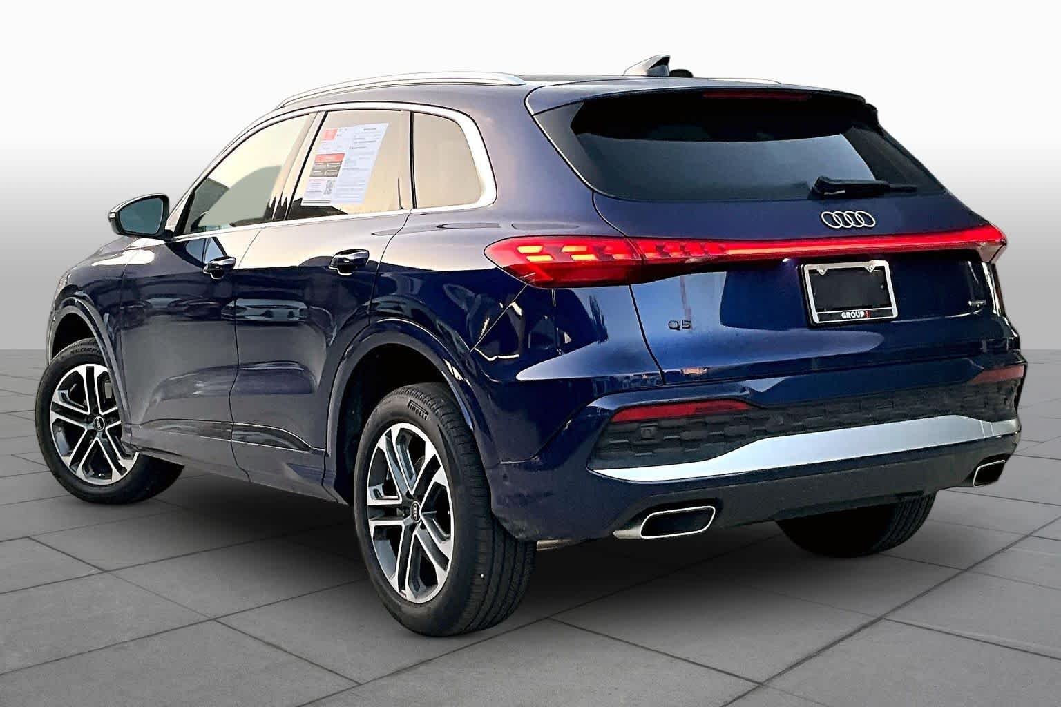 Used 2025 Navarra Blue Metallic Audi Premium image 12