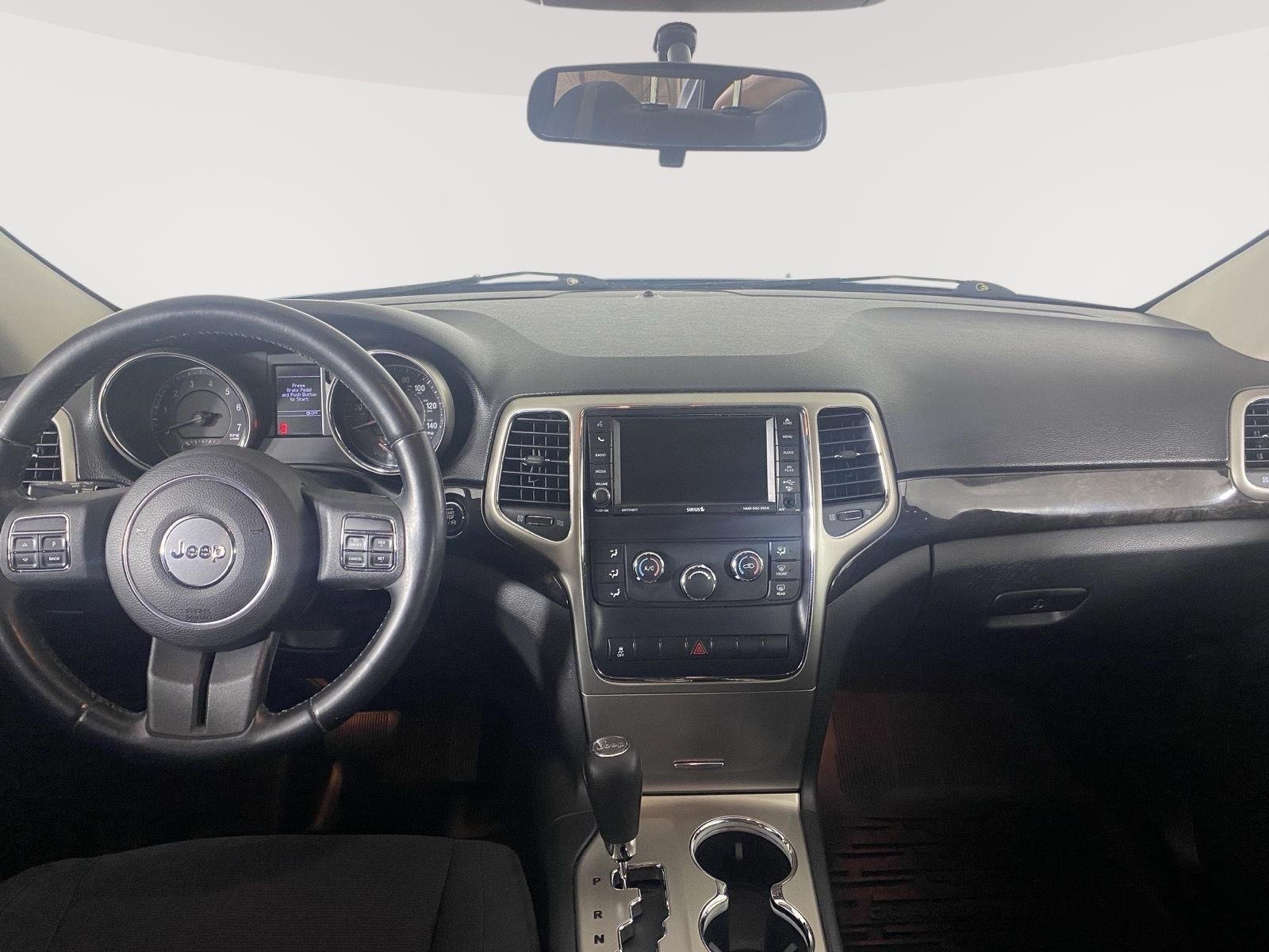 Used 2012 Winter Chill Pearl Jeep Laredo image 4