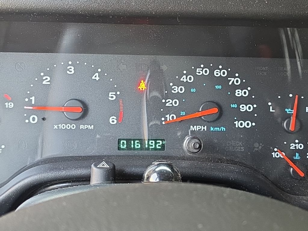 Used 2004 Light Khaki Metallic Jeep Unlimited image 14