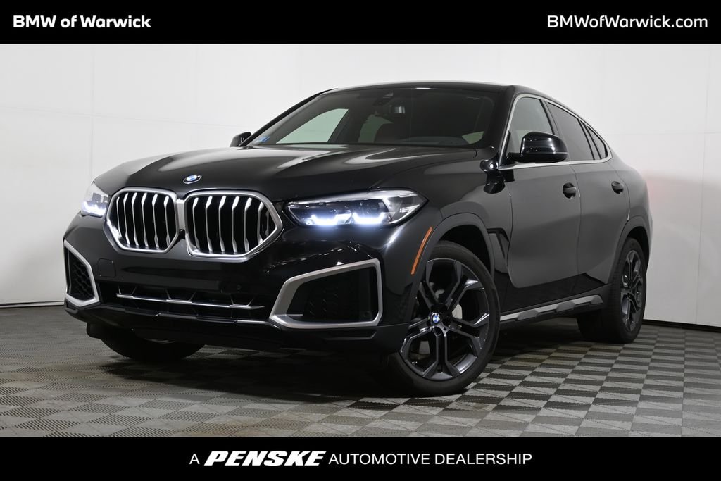 Used 2022 Black Sapphire Metallic BMW xDrive40i image 1