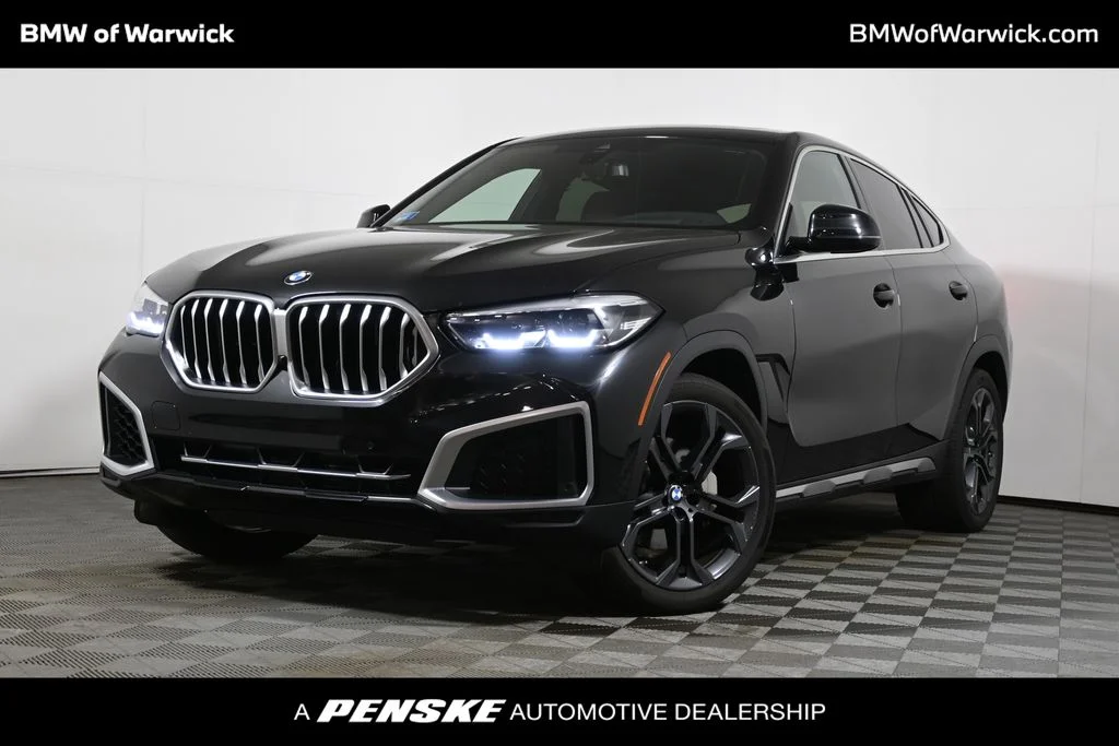 Used 2022 Black BMW xDrive40i image 1