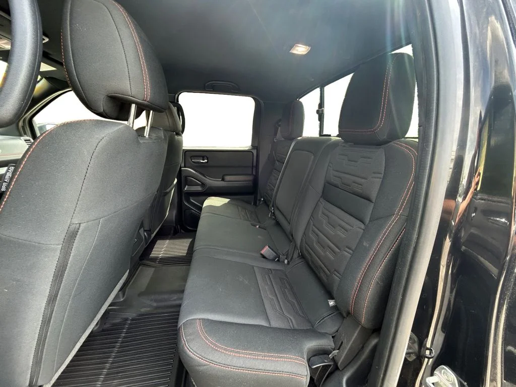 Used 2023 Super Black Nissan  image 13
