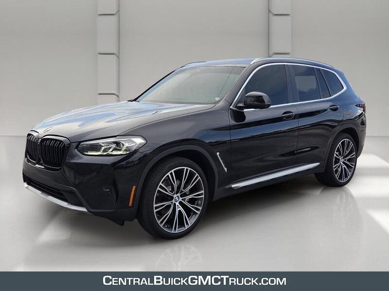 Used 2023 Black Sapphire Metallic BMW SDRIVE30I SPORTS ACTIVITY VEHICLE image 1