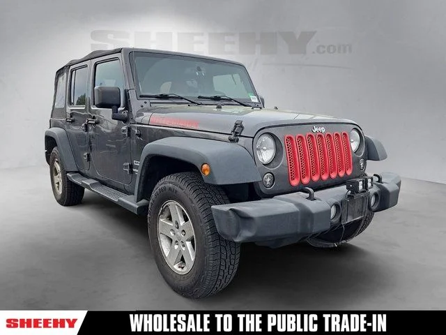 Used 2016 Gray Jeep Unlimited Sport image 1