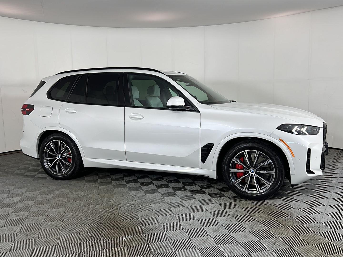 Used 2026 Mineral White Metallic BMW xDrive50e image 3