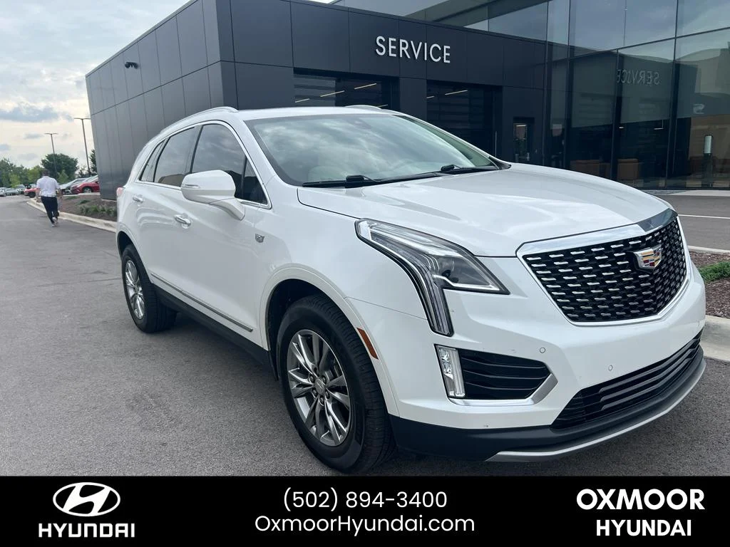 Used 2021 Crystal White Tricoat Cadillac AWD Premium Luxury image 1