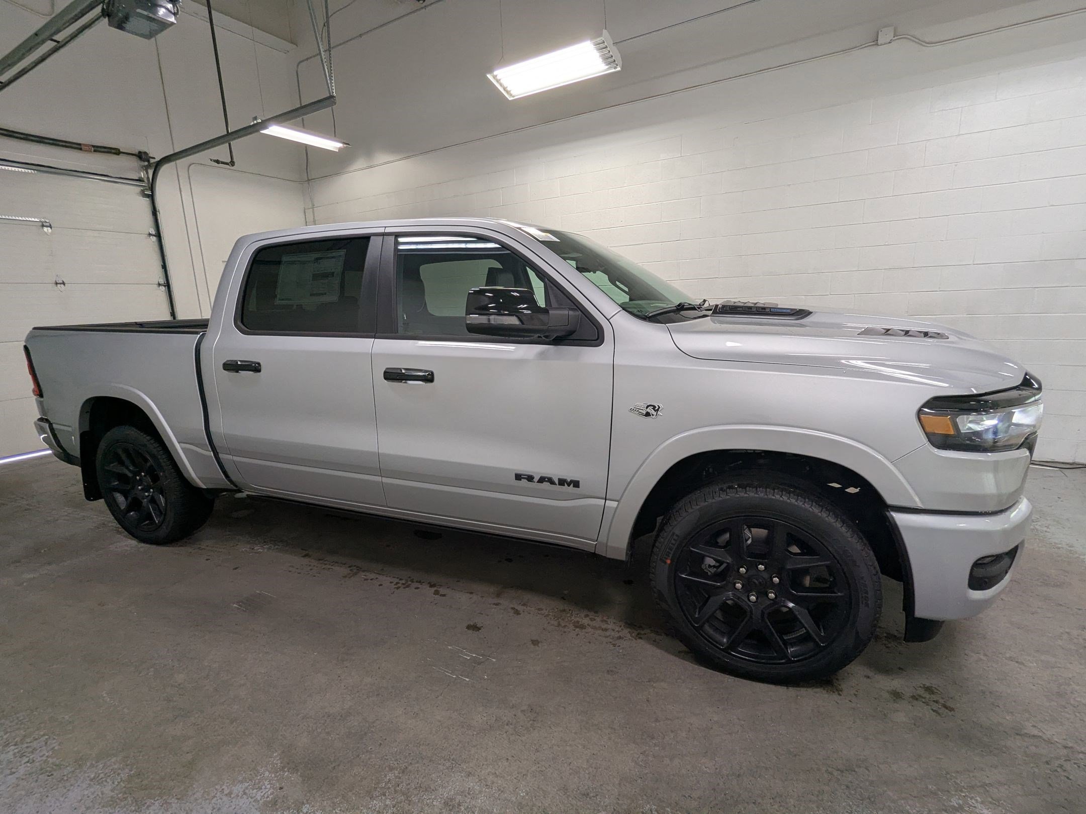 New 2026 Silver Zynith Exterior Paint RAM Laramie image 3