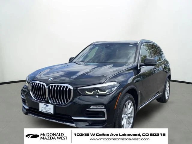 Used 2019 Black BMW xDrive40i image 1