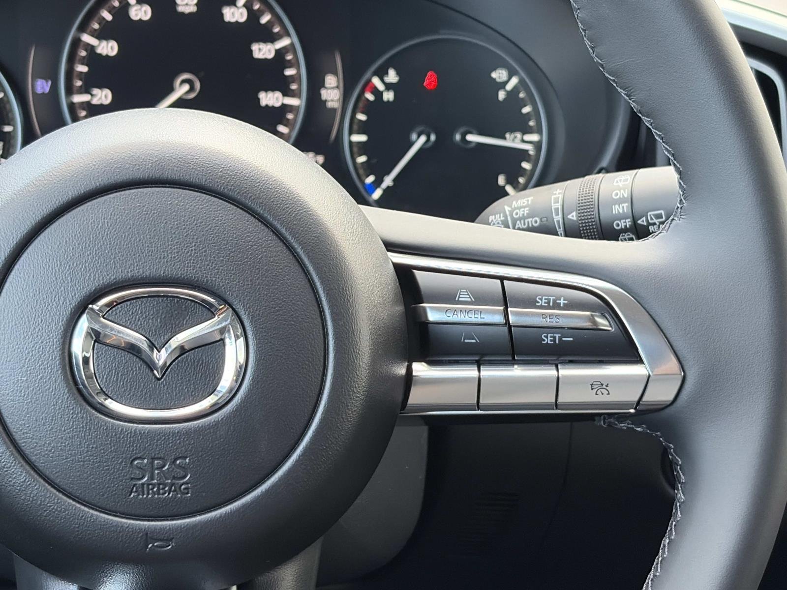 New 2026 Machine Gray Metallic Mazda Premium AWD image 8