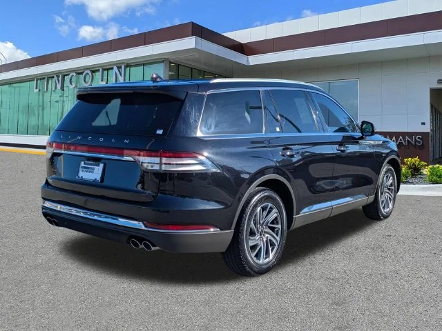 Used 2024 Black Metallic Lincoln Premiere image 4