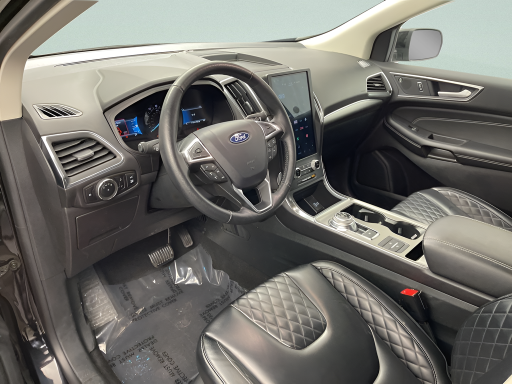 Used 2024 Black Metallic Ford Titanium AWD image 19