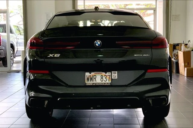Certified Used 2024 Black Sapphire Metallic BMW xDrive40i image 4