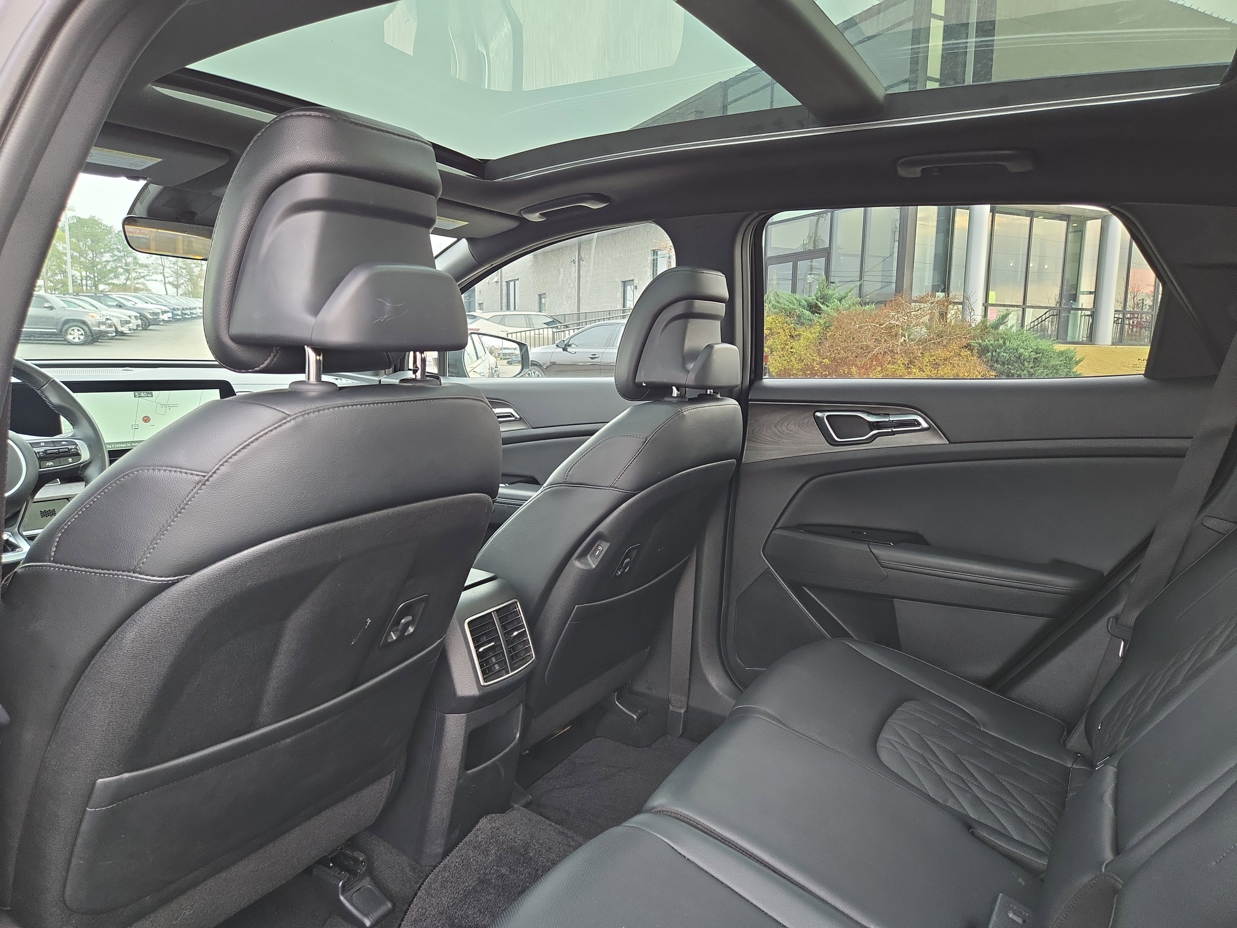Used 2024 Ebony Black Kia X-Pro Prestige image 14