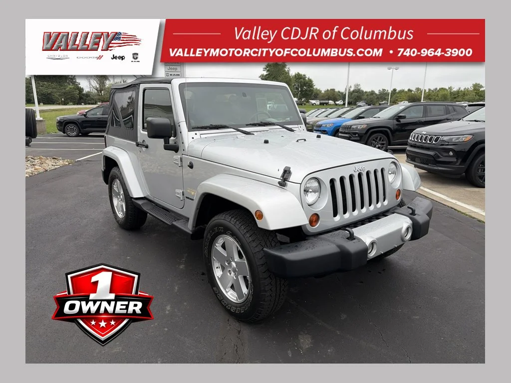 Used 2009 Silver Jeep Sahara image 1