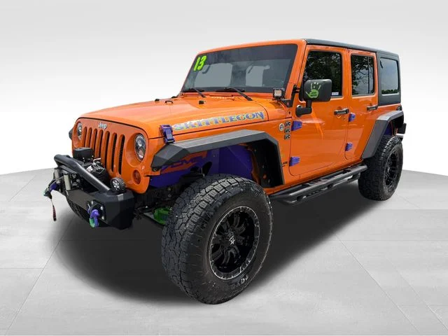 Used 2013 Orange Jeep Unlimited Rubicon image 3