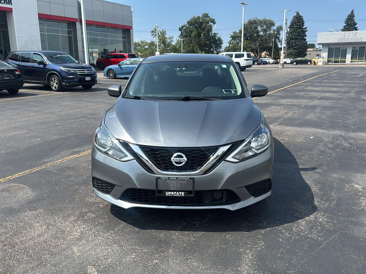 Used 2019 Gun Metallic Nissan SV image 2