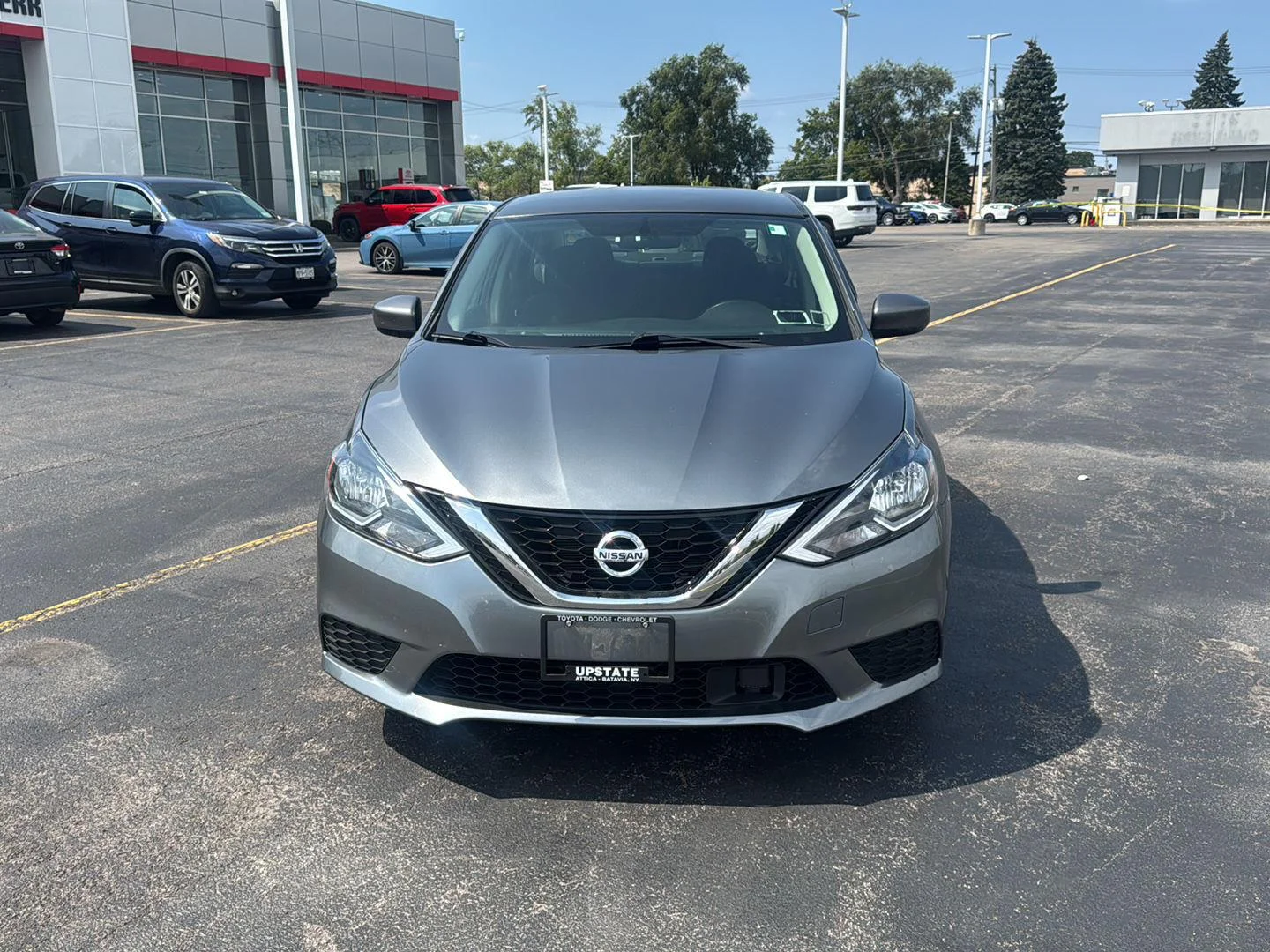 Used 2019 Gun Metallic Nissan SV image 2