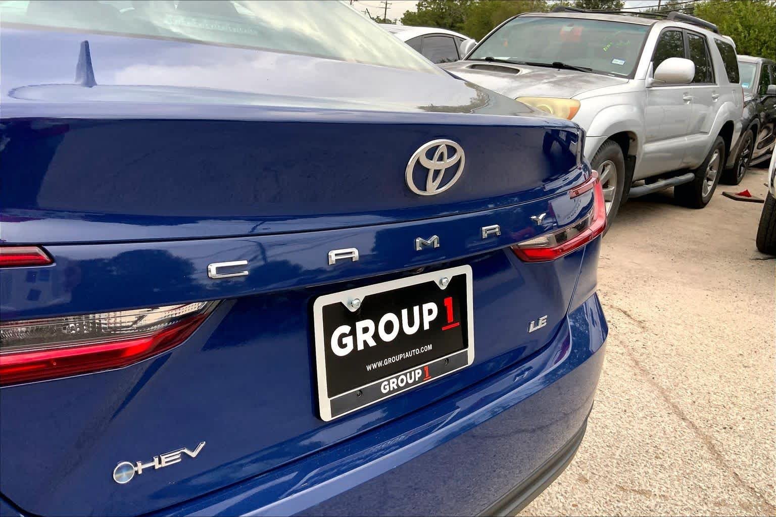 Used 2025 Reservoir Blue Toyota LE image 30