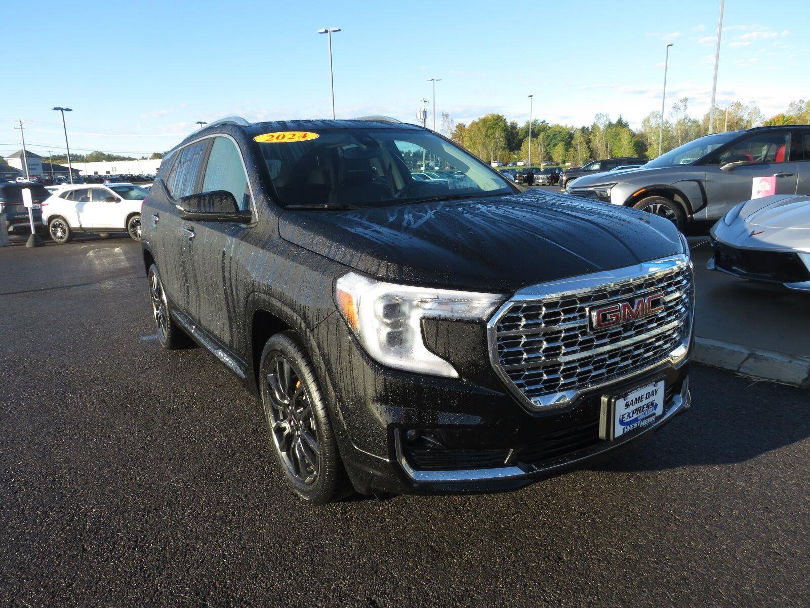 Used 2024 Ebony Twilight Metallic GMC Denali image 2