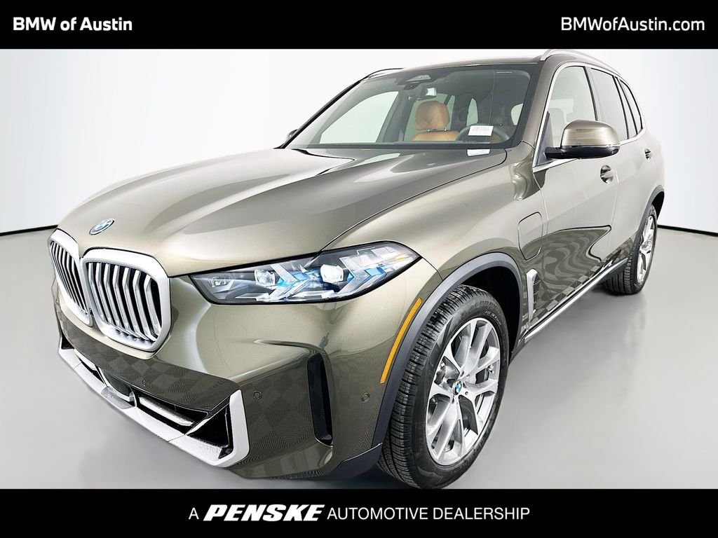 New 2026 Manhattan Green Metallic BMW xDrive50e image 1